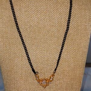Elegant Black and Gold Necklace